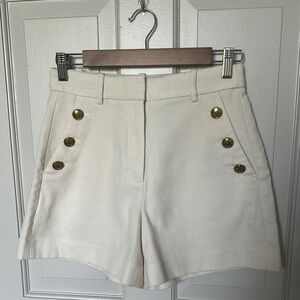 Elegant Cream Shorts with Gold Accents